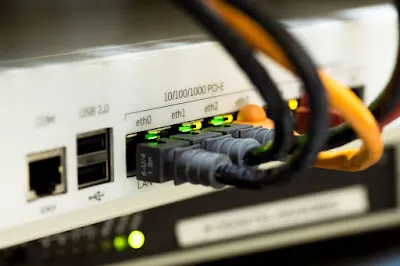 Close-up of computer network cables connected to a switch